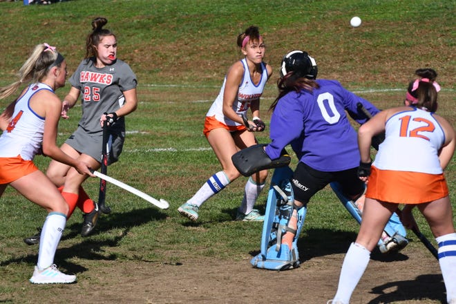 Woodstown senior Chloe Cuzzupe eyes a rebound she would settle and pass to Dana DeSiato for the only goal of the game against Haddon Township