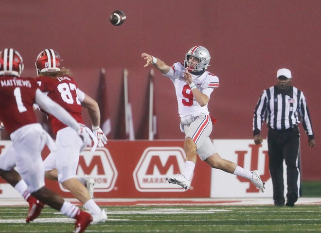 Ohio State Buckeyes quarterback Jack Miller III (9) throws a pass during the fourth quarter of the NCAA football game at Memorial Stadium in Bloomington, Ind. on Saturday, Oct. 23, 2021. Ohio State won 54-7.