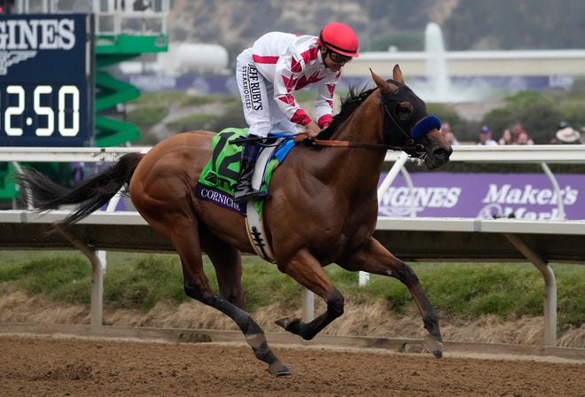 Nov 5, 2021; Del Mar, CA, USA;  Corniche finishes in first place in the Breeders’ Cup Juvenile race during the Breeders’ Cup World Championships at Del Mar Race track. Mandatory Credit: Ray Acevedo-USA TODAY Sports