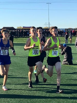 Will Baker, left, and Mount Gilead teammate Reed Supplee compete at the 2021 state cross country championships held at Fortress Obetz last season. The Mount Gilead boys finished as Division III runners-up.