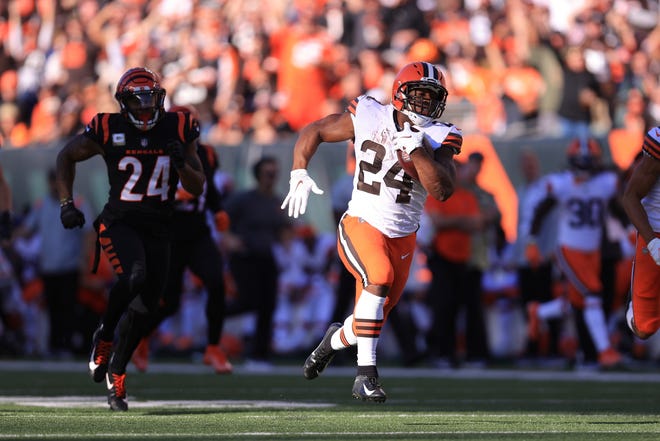 Browns running back Nick Chubb (24) has tested positive for COVID-19 and his availability for Sunday's game is in question. [Aaron Doster/Associated Press]