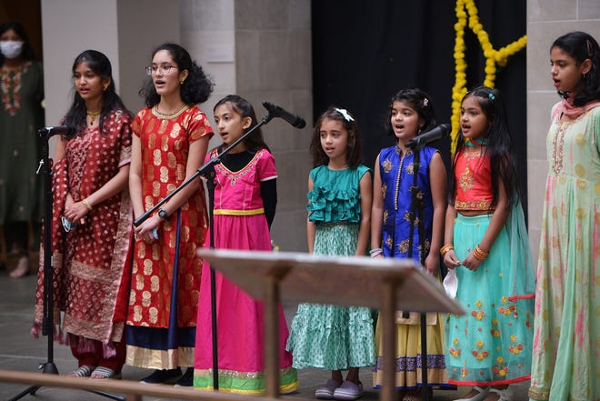 The first performers sing at the opening of the Diwali program. India Society of Worcester held their Diwali celebration at the Worcester Art Museum Sunday.