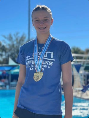Community School of Naples' Charlotte Norman won the 1-meter diving at the Class 1A state meet in Stuart on Saturday, Nov. 6, 2021.