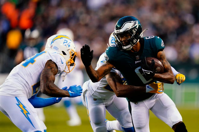 Philadelphia Eagles wide receiver DeVonta Smith (6) runs with the ball after a catch during the first half of an NFL football game against the Los Angeles Chargers on Sunday, Nov. 7, 2021, in Philadelphia. (AP Photo/Matt Slocum)
