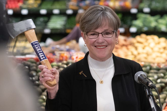 Gov. Laura Kelly, who lobbied for a larger sales tax cut on food, plans to sign a Republican plan to gradually reduce the 6.5% state tax rate on groceries.