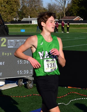 Keith Neuburger finishes strong for Mason at the 2021 OHSAA boys Division I cross country championships, Nov. 6, 2021.