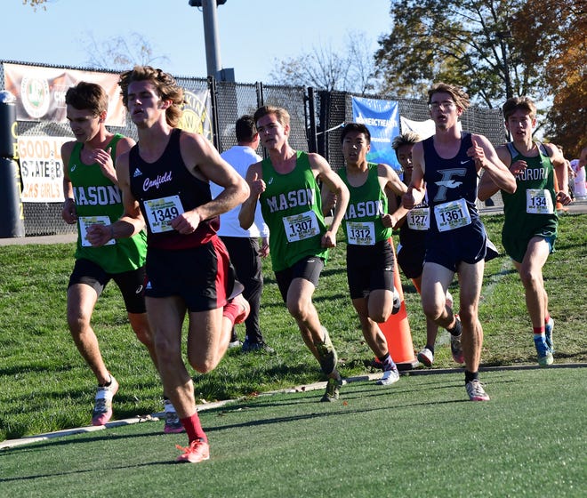 Mason runners paced to a collective first-place finish at the 2021 OHSAA boys Division I cross country championships, Nov. 6, 2021.