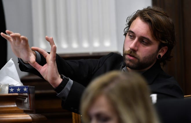 Gaige Grosskreutz talks about the lasting damage to his arm after being shot by Kyle Rittenhouse as he testifies at the Kenosha County Courthouse in Wisconsin on Monday.