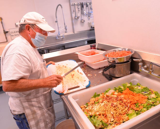 The Spartanburg Soup Kitchen has plans for a big Thanksgiving meal and celebrations for guests during this years' holiday.  Volunteers, including Tommy Stokes, work to prepare a meal at The Soup Kitchen in Spartanburg, Monday, November 9, 2021.