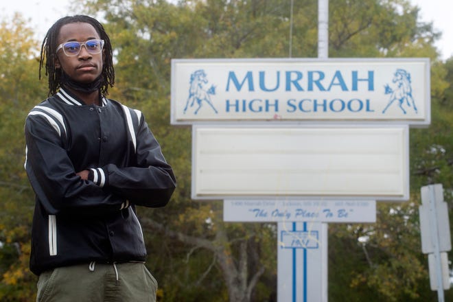 Hart Jefferson poses for his portrait outside of Murrah High School in Jackson, Miss., Friday, Nov. 5, 2021. Jefferson was the first student from Murrah to appear at the National Speech and Debate Association's Big Questions competition in June.