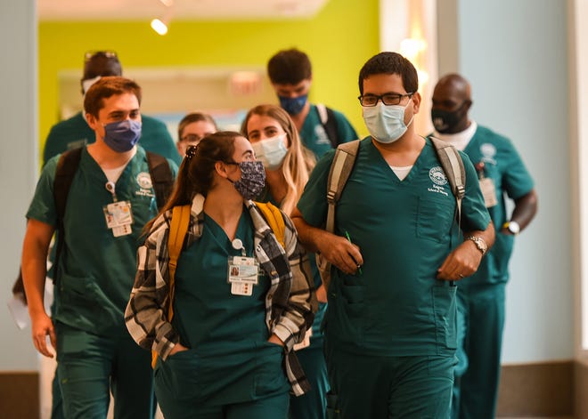 Students in Jacksonville University's 12-month accelerated nursing-degree program begin their first days of clinical training at Baptist Medical Center Jacksonville.