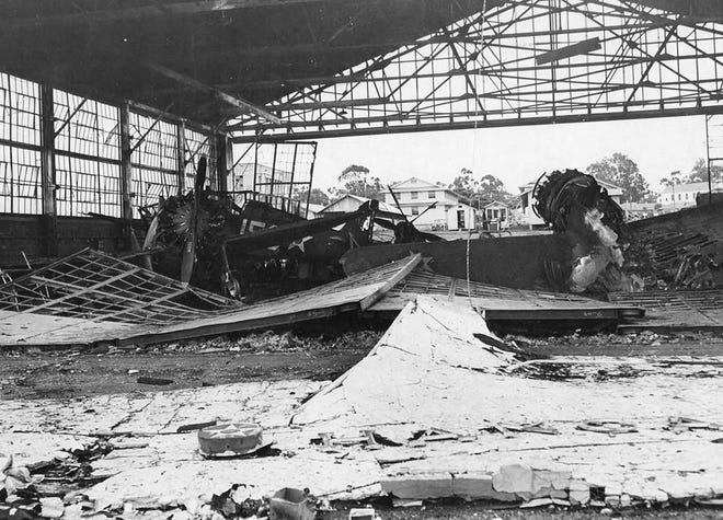 Inside a destroyed aircraft hangar at Wheeler Field in Hawaii on Dec. 11, 1941.