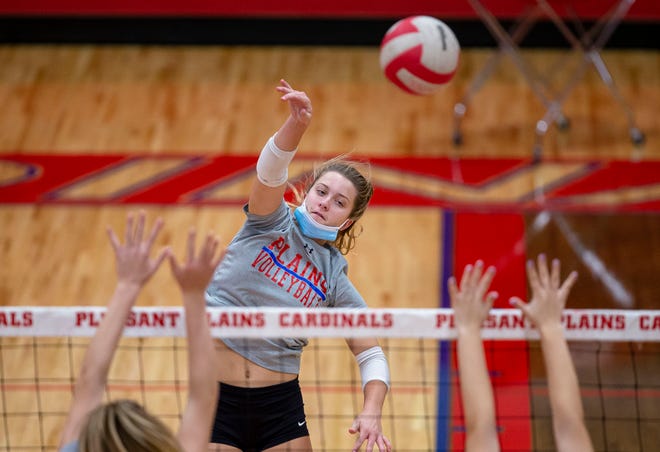 Pleasant Plains’ Peyton Bergschneider sends a hit over the net as the Cardinals go through drills during practice at Pleasant Plains High School in Pleasant Plains, Ill., Tuesday, November 9, 2021. [Justin L. Fowler/The State Journal-Register] 