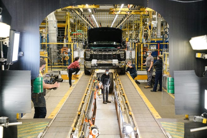 The first pickup trucks coming down the assembly line at Oshawa Assembly in Ontario on Nov. 10, 2021.