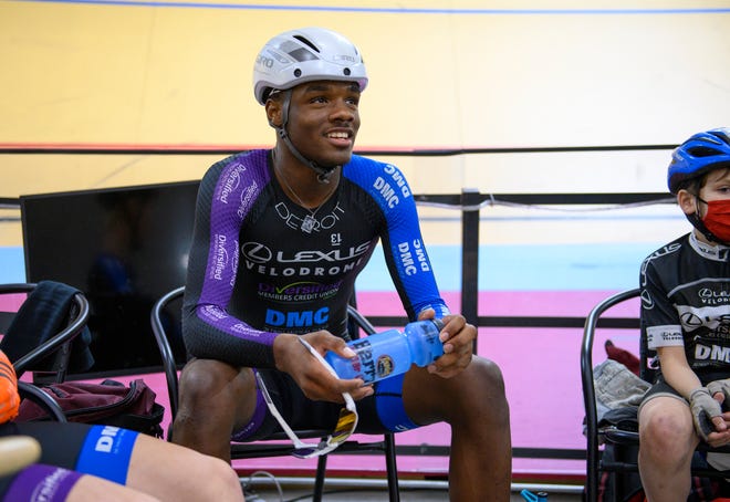 Donnell Anderson, 15, Detroit jokes with teammates during practice at the Lexus Velodrome in Detroit on Tuesday.
