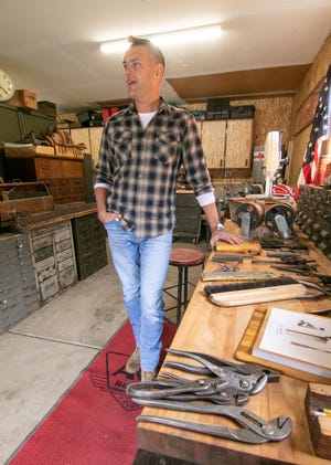 Justin Billard talks about his passion for bringing old tools back to life to benefit veterans Tuesday, Nov. 9, 2021 at his Brighton Township residence.