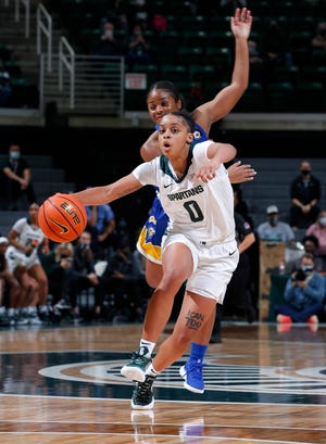 Michigan State's DeeDee Hagemann drives against Morehead State, Tuesday, Nov. 9, 2021, in East Lansing, Mich.