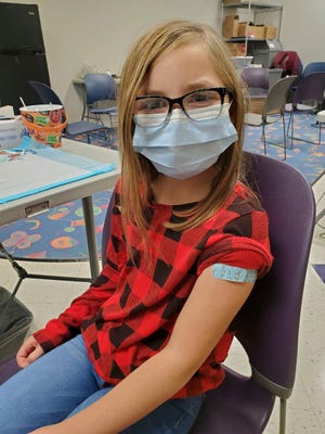 Marley Knapp, 10, was happy after receiving her COVID-19 vaccine this week, courtesy of OhioHealth.
