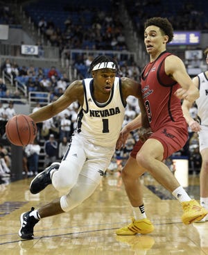 Nevada's Kenan Blackshear drives against Eastern Washington's Angelo Allegri during Tuesday's game at Lawlor Events Center.