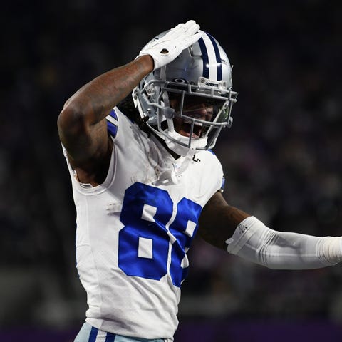 CeeDee Lamb of the Dallas Cowboys reacts against t