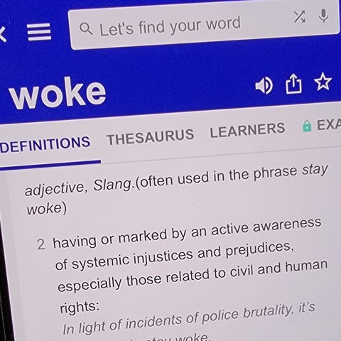 A divisive slang word is "woke," which means to be