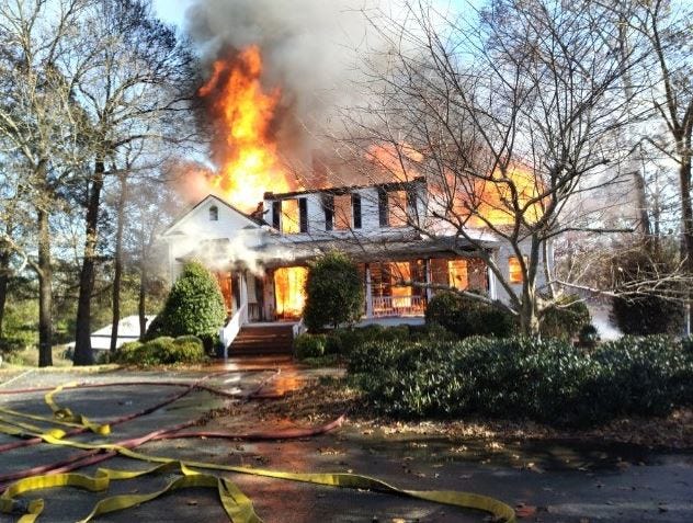 A fire completely destroyed the home of a Commerce businessman earlier this week.