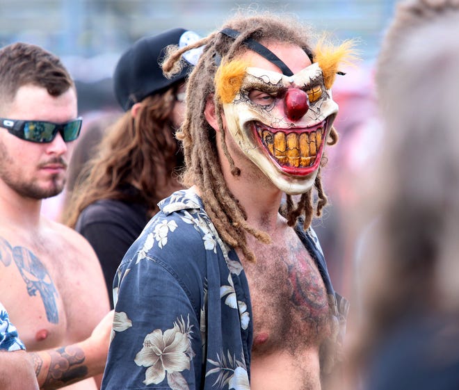 Wild face masks are everywhere, Thursday, Nov. 11, 2021, as Welcome to Rockville kicks off at Daytona International Speedway.