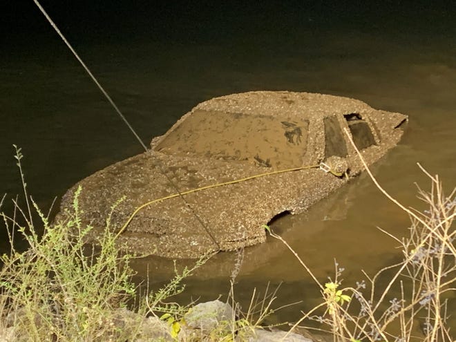 A mud-and-silt covered car pulled from Melton Hill Lake in Oak Ridge on Wednesday night belonged to Miriam Ruth Clark Hemphill, who has been missing since 2005.