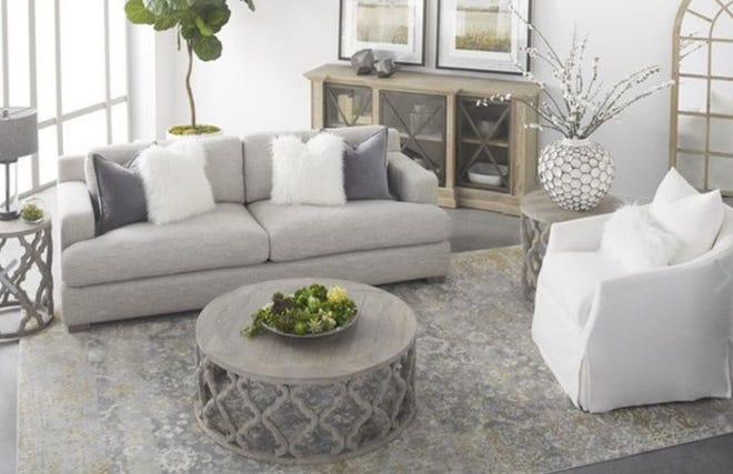 Signature Home Market is releasing sneak peeks of their merchandise, such as this couch and coffee table in the lead up to their first sale on Nov. 27-28
