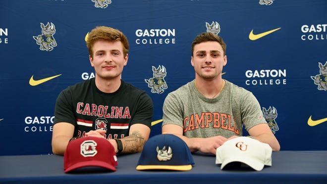 Infielder Chandler Riley (right) and pitcher Zach Zedalis officially signed a National Letter of Intent to attend Campbell and South Carolina, respectively