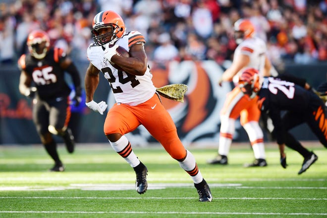 Browns running back Nick Chubb carries the ball against the Bengals, Sunday, Nov. 7, 2021, in Cincinnati.