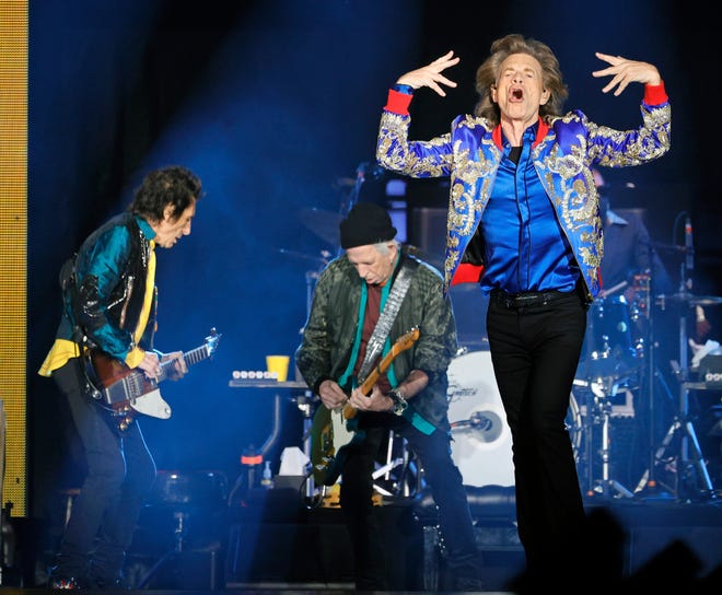 Guitarists Ronnie Wood and Keith Richards and singer Mick Jagger of the Rolling Stones perform during a stop of the band's No Filter tour at Allegiant Stadium on Nov. 6, 2021, in Las Vegas, Nevada.