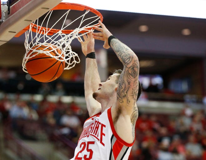 Ohio State forward Kyle Young returned to action on Friday and scored on an alley-oop dunk in his first minute on the court.