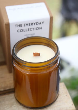 A 100% vegan soy wax candle with wooden wick from the Daily Burn Candle Studio.