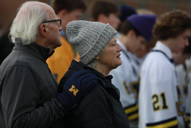 The community gathers on the football field at Rochester Adams High School organized by a Facebook group 'Bring Brendan Santo Home' to pray on Nov. 13, 2021. Police in East Lansing have been searching for Brendan Santo for nearly two weeks. Santo, a Grand Valley State University student was last seen leaving Yakeley Hall on foot just before midnight on Oct. 29, according to Michigan State University police and suspect Santo may have been walking to the Brody neighborhood and do not believe he left the East Lansing area.