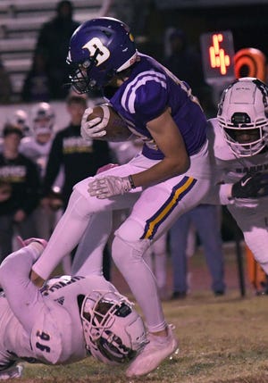 Benton's Pearce Russell catches Hahnville in a Class 5A playoff game on Friday