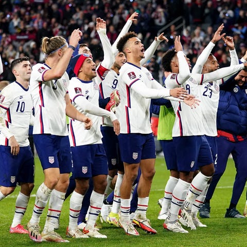 The U.S. men's national soccer team celebrates its