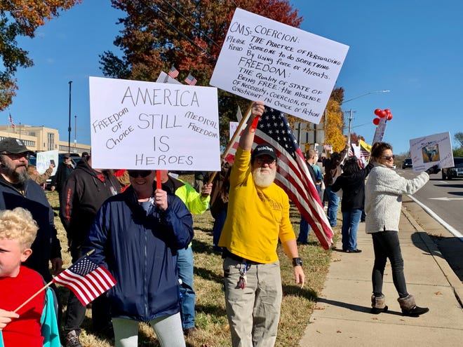 Protestors, set up outside of Maury Regional Medical Center, join together to speak out against COVID vaccine mandates for medical workers on Saturday, Nov. 13, 2021.