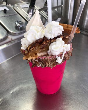 The Southern Pecan Pie extreme milkshake from the Dairette is a sea salt caramel shake topped with a whole slice of pecan pie and other goodies.
