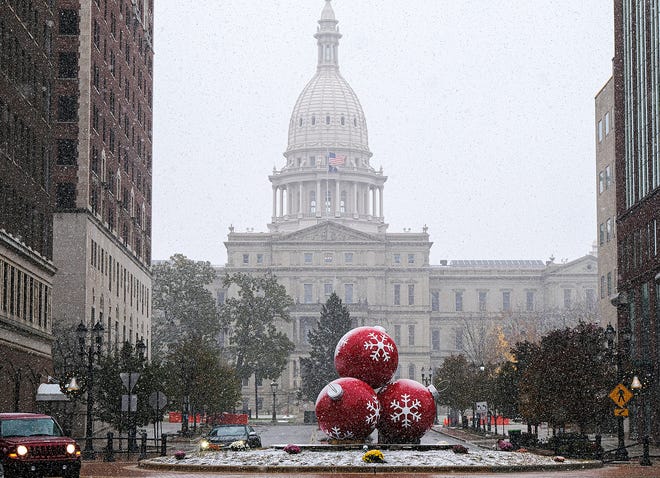 Lansing area residents woke up to some wintry weather Sunday, Nov. 14, 2021 with temperatures in the low to mid 30’s and wet snow.