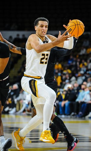 UW-Milwaukee Panthers guard Patrick Baldwin Jr. drives to the basket against the Eastern Kentucky Colonels on Saturday at UW-Milwaukee Panther Arena.