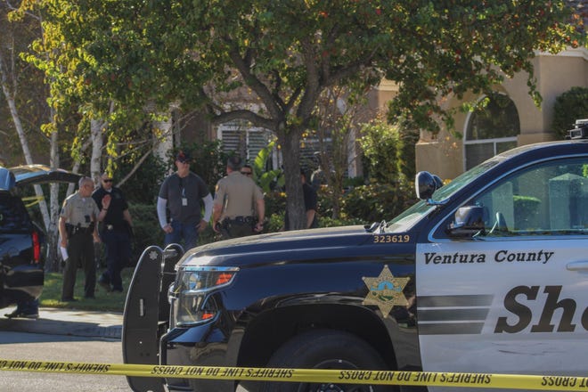 Ventura County Sheriff's investigators at the scene of an apparent murder-suicide in Moorpark on Saturday.