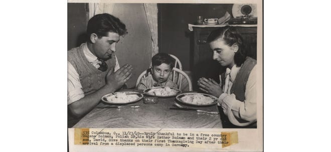 Eugene and Esther Boiman and their son, David, celebrate their first Thanksgiving in Columbus in 1949. Eugene and Esther had spent time in Polish displaced-persons camps in Germany. The business of Esther’s family was confiscated, and the family was sent to Treblinka concentration camp during World War II. Esther’s parents and three younger sisters died there, and Esther was sent to Auschwitz after attempting to escape. She met Eugene in Belsen after being freed by the British in 1945, and they were married in 1946 and settled in Columbus in 1949. Eugene worked as a tile setter for Duratile, and the couple had four children.
