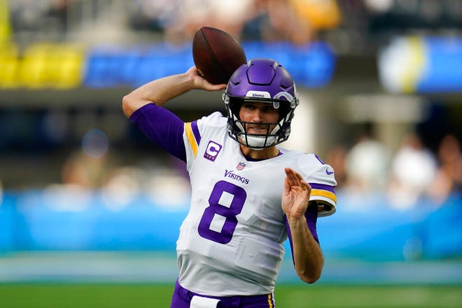 Minnesota Vikings quarterback Kirk Cousins (8) warms up before an NFL football game against the Los Angeles Chargers Sunday, Nov. 14, 2021, in Inglewood, Calif. (AP Photo/Marcio Jose Sanchez)