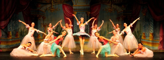 Braintree Ballet's "Nutcracker" cast includes, from left, Lucy Pimental, Sophia Cheung, Alexandra Dodge, Gabrielle Cassidy, Lexi Downing, Abigail Nicholas, Gwendolynne Jenkins, Michaela Heath, Ianna Tai, Ashleigh O'Keefe, Claire Mortimer, Emily Nicholas and Riley Pendergast.