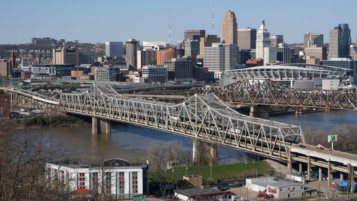 The bill designates $40 billion for bridge repair, replacement and rehabilitation.   The heavily travelled Brent Spence Bridge spans the Ohio River on the Ohio-Kentucky border in Cincinnati, Ohio on April 2, 2021.