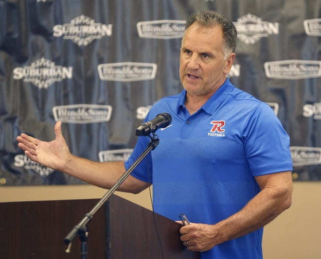 St. Vincent-St. Mary has hired alum Terry Cistone to serve as the Irish football coach. In this photo, Cistone addresses the Suburban League football media day as Revere's coach on Wednesday, July 31, 2019 in Cuyahoga Falls, Ohio, at the Natatorium. [Phil Masturzo/Beacon Journal/Ohio.com]