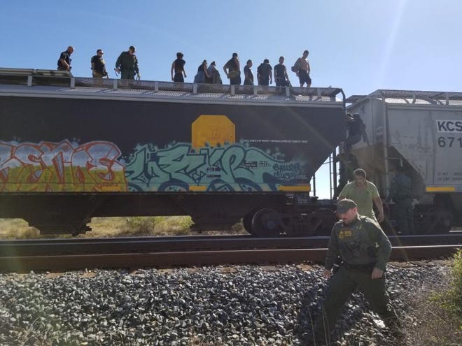 Duval County Sheriff Office rescued individuals who were trapped inside a grain hopper railcar southwest of San Diego, Texas. Inside the locked grain hopper, agents found a total of 10 individuals.