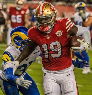 San Francisco 49ers wide receiver Deebo Samuel (19) runs for touchdown on Monday, November 15, 2021, at Levis Stadium in Santa Clara, California. The 49ers defeated the Rams 31-10.