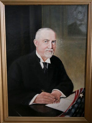 A framed portrait of Gov. James Withycombe, the governor of Oregon from 1915 to 1919.